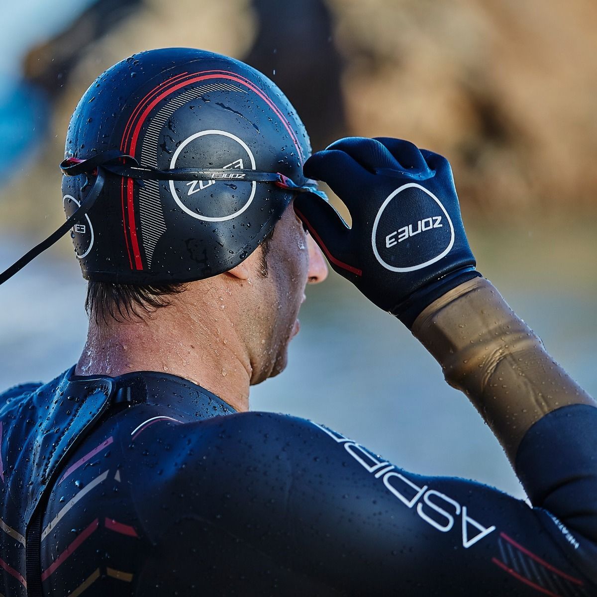 Zone3 Neoprene Heat-Tech 3.5mm Swim Gloves featuring extended wrist seal and titanium lining for cold-water swimming.