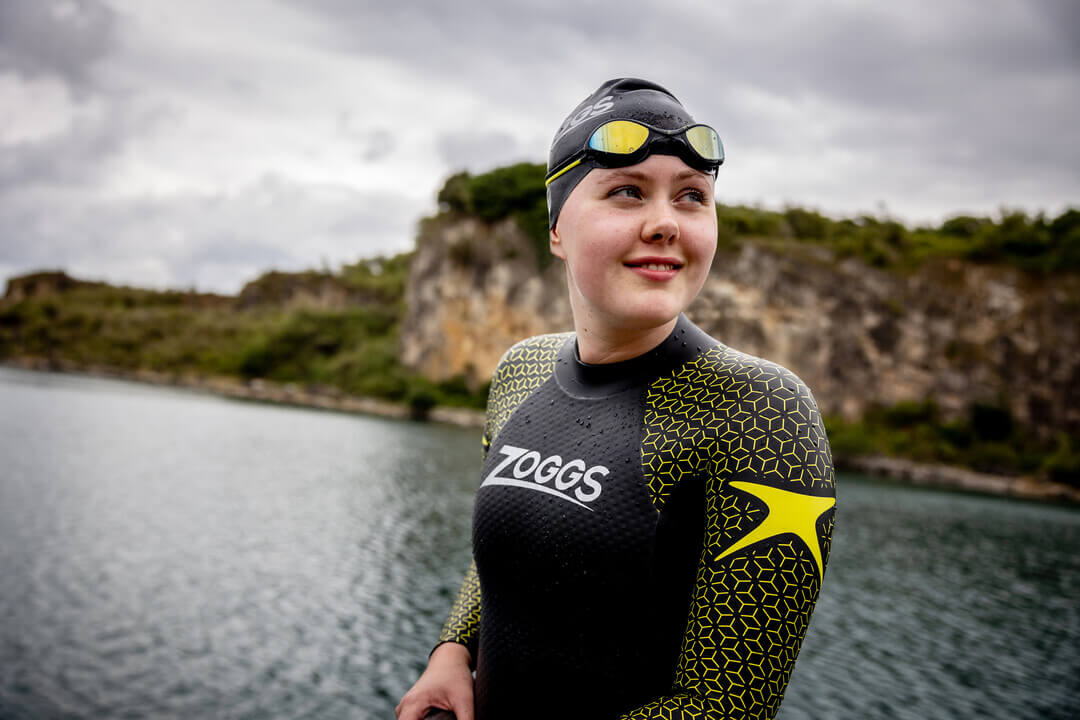 Swimmer about to enter the water at south west maritime academy.