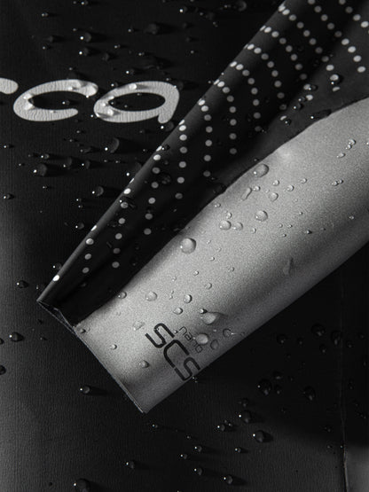 Mens Orca Apex Flow wetsuit quick transition cuffs with water droplets. 
