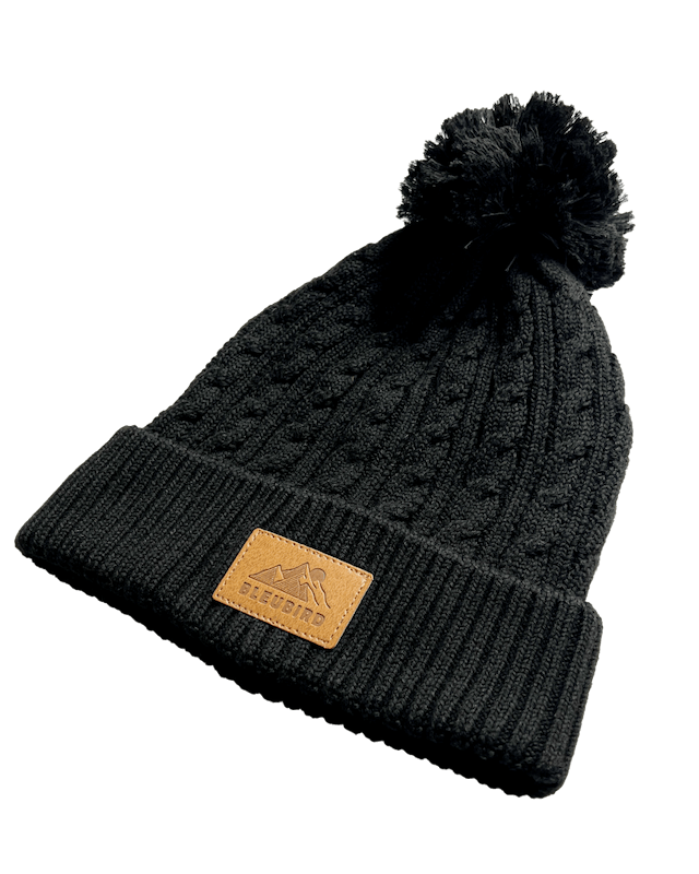 A Black bobble hat, great for cold water swimming