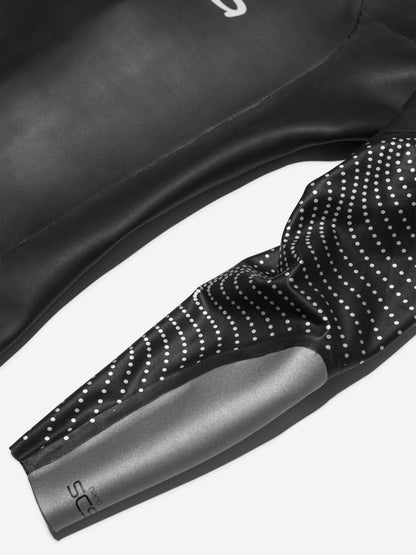 Close up of the Orca Apex Flow wetsuit super thin and flexible arm sleeves. 