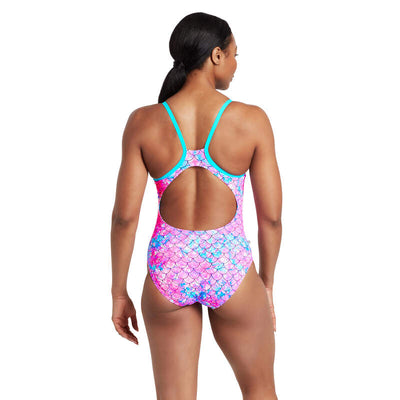 Women’s Zoggs Sirene Sparkle Silver-Lined Strikeback swimsuit in shimmering pink and blue mermaid pattern with thermal lining and eco-friendly fabric