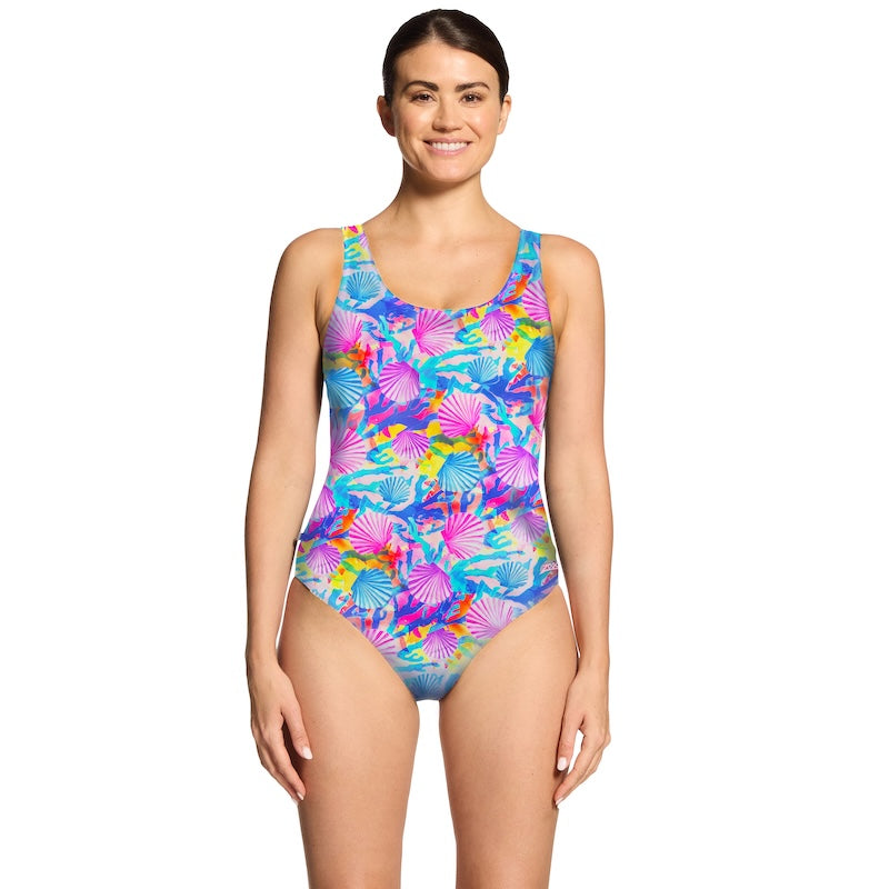 Woman wearing a colorful crazy clams patterned Zoggs swimsuit on a white background