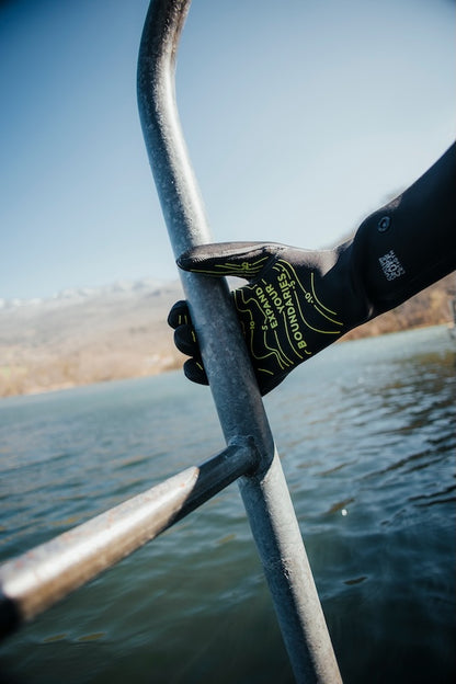 Zoggs neoprene swimming gloves being used for a cold water swimming dip. 